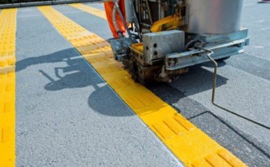 THERMOPLASTIC ROAD MARKING compressed